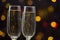 Close-up of two glasses with bubbly champagne