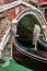 Close up of Two Gondola\'s Iron Prow and Antique Bridge in Venice