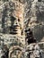 Close up of two Khmer Bayon faces, Angkor Wat, Siem Reap, Cambodia