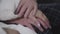 Close-up of two pairs of senior Caucasian hands. Man caressing woman`s hand. Eternal love, relationship, unity