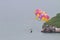 Close up of two persons on a Parasailing boat ride