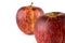 CLOSE UP OF TWO STRIPPED APPLES ISOLATED AGAINST WHITE BACKGROUND