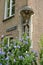 Close-up on a typical 17th century house, with a statue representing Virgin Mary and a child, located on De Bosquetplein