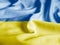 Close up of the Ukraine flag on a ruffled mesh fabric