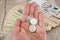 Close-up of Ukrainian coins in a female hand. Financial concept. Money stack.