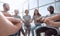 Close up. United team of young people sitting in a circle