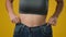 Close up unrecognizable slim slender sport woman lady female athlete girl in large size big jeans showing weight loss