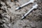 Close up of used drug syringes on ground