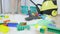 Close up of vacuum cleaner and woman legs on rug at home