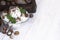 Close up Vanilla ice cream with mint, macadamia and pecan nuts and chocolate on whit background. . Ice cream decoration. Summer,