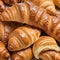 Close up of various croissant pastries