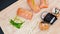 Close Up Of Various Types Of Japanese Fresh Prepared Sushi. Top view dynamic rotation footage.