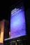 Close up vertical shot of Leeds Beckett University lite up