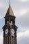 Close-up vertical view of the clock tower of New Jersey Transit`s historic Hoboken Terminal