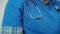 Close up of a vet\'s uniform with a stethoscope