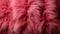 A close up of a vibrant magenta fur texture