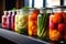 close-up of vibrant pickled vegetables in glass jars