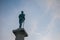 Close up on the Victor statue on Kalemegdan fortress, during a sunny sunset afternoon, seen from behind.