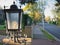 Close-up of Victorian cast iron lantern on a suburban street.