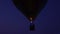 Close up video of propane gas fire burner in colorful hot air balloons flying over above the ground