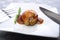 Close-up view of Abalone being served in a restaurant