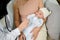 Close up view of adorable baby being checked by a doctor using a stethoscope