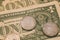 Close up view of American dollar bills and coins as background. Heap of American dollars for design.