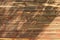 Close-up view of ancient brown wooden background texture. Shabby brown wooden planks. Aged wooden planks. Abstract background