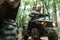 Close up view of another transport. Young couple riding a quad bike in the forest