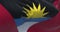 Close-up view of the Antigua and Barbuda national flag waving in the wind