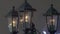 Close-up view of antique copper lantern decorated with Christmas lights