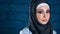 Close up view of attractive muslim woman in hijab with expressive glance