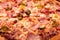 Close up view of baked piza ingredients