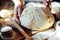 Close up view of baker kneading dough. Homemade bread. Hands pre