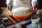 Close up view of baker kneading dough. Homemade bread. Hands preparing bread dough on wooden table. Preparing traditional