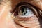 Close up view beautiful blue wrinkled eye macro detail human vision eyesight eyelash optical eyeball eyelid healthcare
