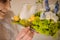 close-up view of beautiful easter plant composition decorated with flowers and toy chicks