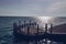 Close up view of breakwater and sea in sunlight