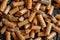 Close-Up View of Brown Pellet Texture Highlighting Sustainable Biomass Energy