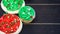 Close up view of buttercream sugar cookies and cupcakes iced for the Christmas holiday. Room for text copy space