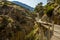 A close up view of the Caminito del Rey pathway suspended above the Gaitanejo river gorge near Ardales, Spain