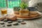 Close-up view of a ceramic centerpiece containing three pots and a plant