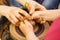 A close up view on ceramic production process on potter`s wheel with children. Clay crafts with kids concept