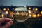 Close-Up View of a Charming Suburban House through a Magnifying Glass