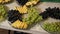 Close-up view of chef serving fresh fruits on plates