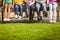 Close up view of classmates sitting on bench