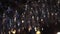 Close-up view of clean washed and polished glasses for wine and other alcoholic drinks hanging over the bar counter