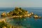 A close up view of the coastline and Isola Bella, Taormina, Sicily