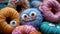 A close-up view of a collection of yarn and knitted donuts with expressive eyes, blending creativity and whimsy in a charming