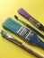 Close-up view of colorful brushes